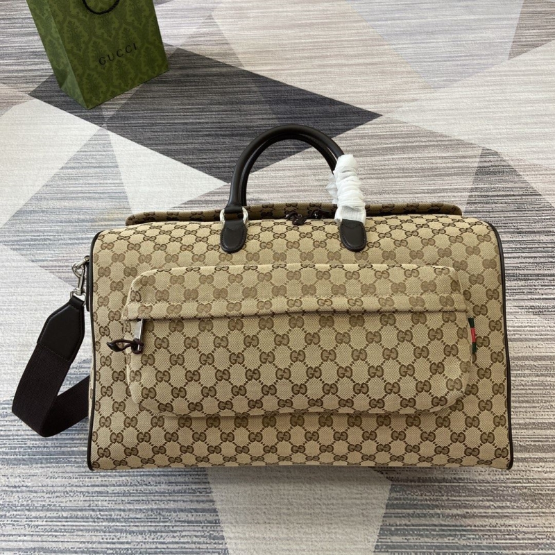 G*u*i top handle bags